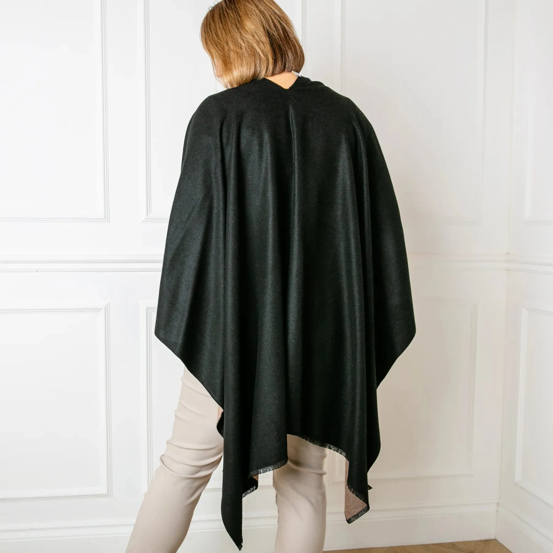 Black & Camel Tess Reversible Poncho Wrap by Tilley ad Grace