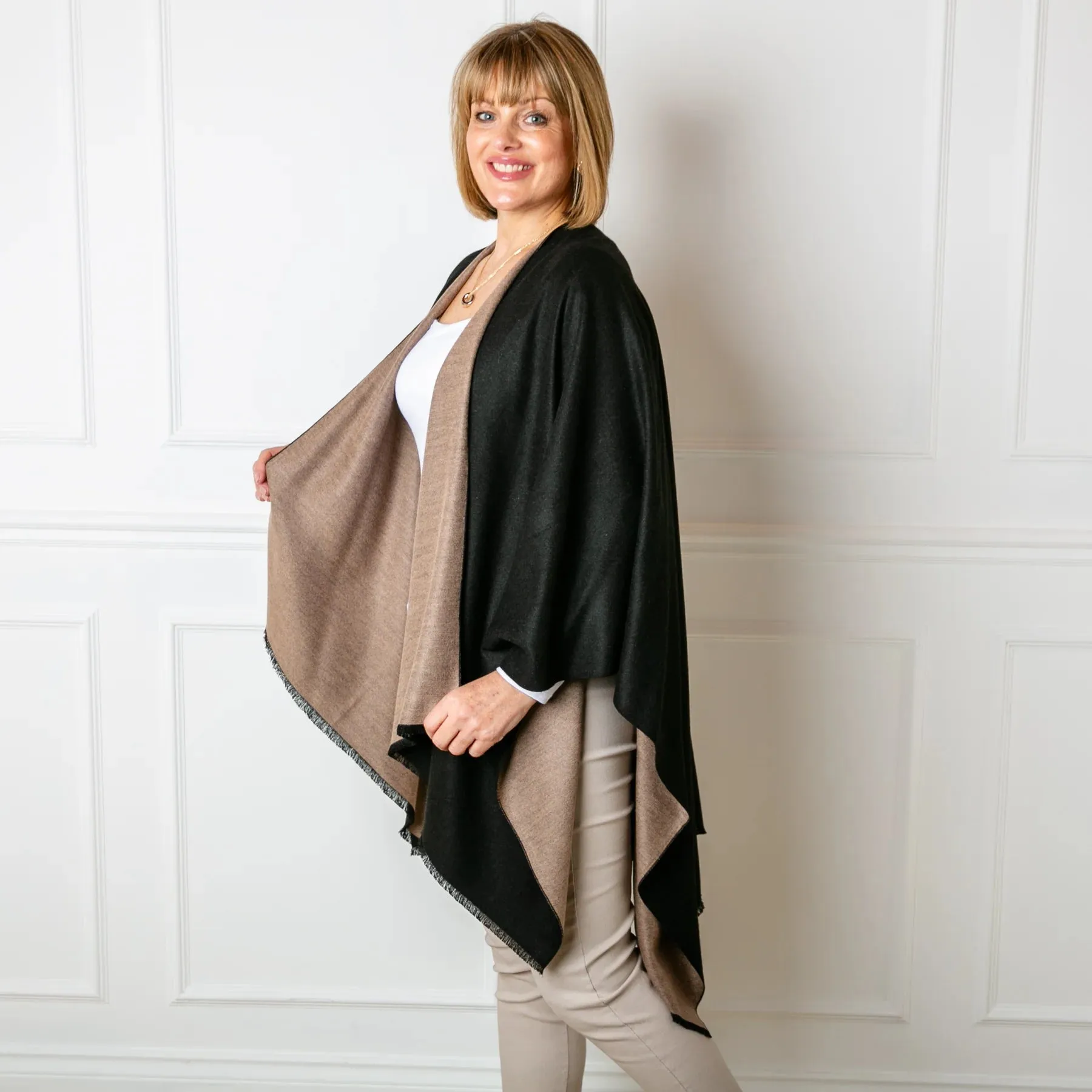 Black & Camel Tess Reversible Poncho Wrap by Tilley ad Grace